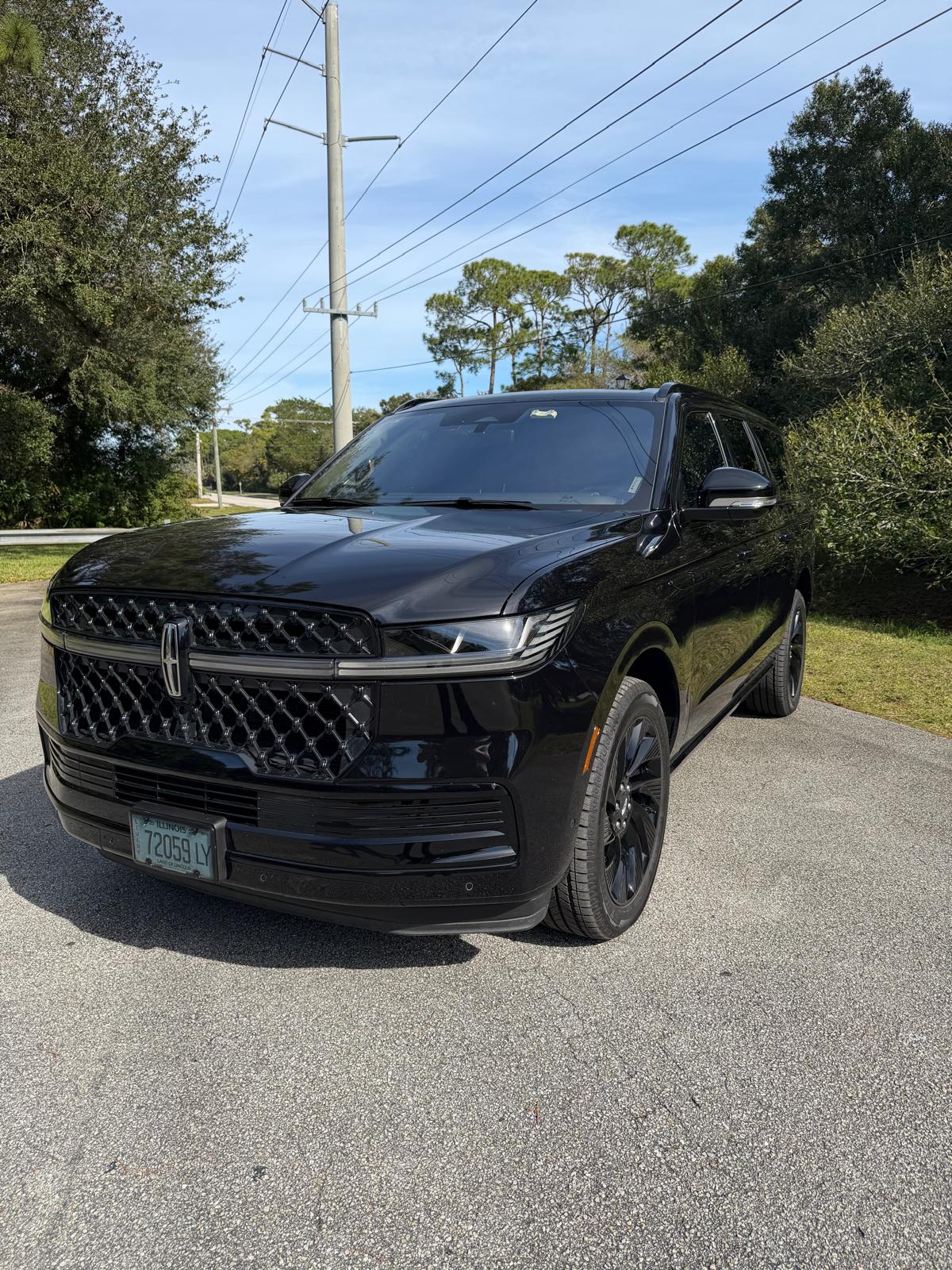 Elite Limo Group luxury SUV ready for an airport transfer